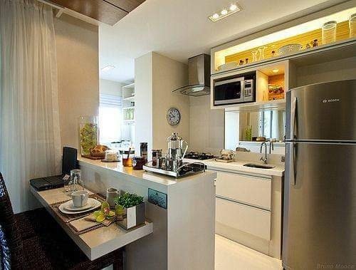 Cozinha americana com bancada de apoio em Osasco