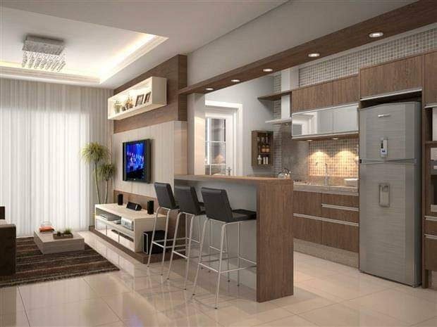 Cozinha e sala integradas com bancada alta